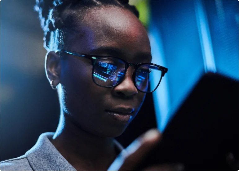 woman-looking-at-tablet.webp