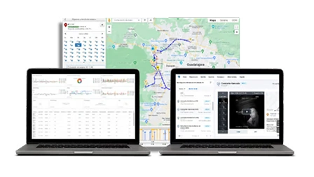 Fleet-management-platform-displayed-on-two-laptops-showing-dashboard-and-tracking-interface.webp